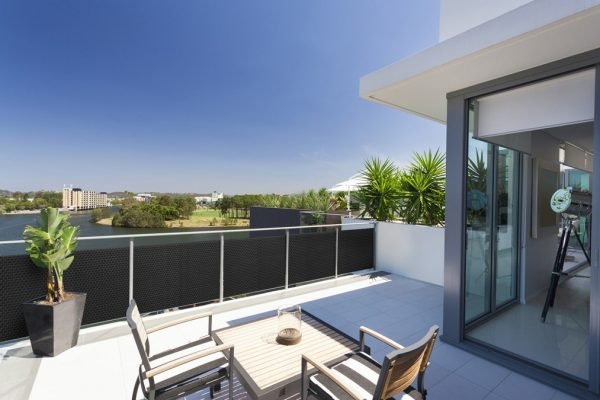 Small balcony overlooking the suburbs